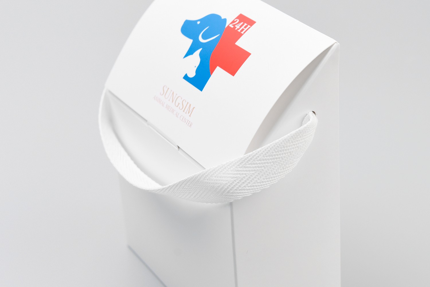 성심동물병원 반려동물용품 리본손잡이 패키지 제작하여 1